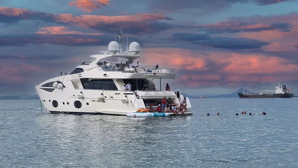 Friends celebrating on a Gem yacht